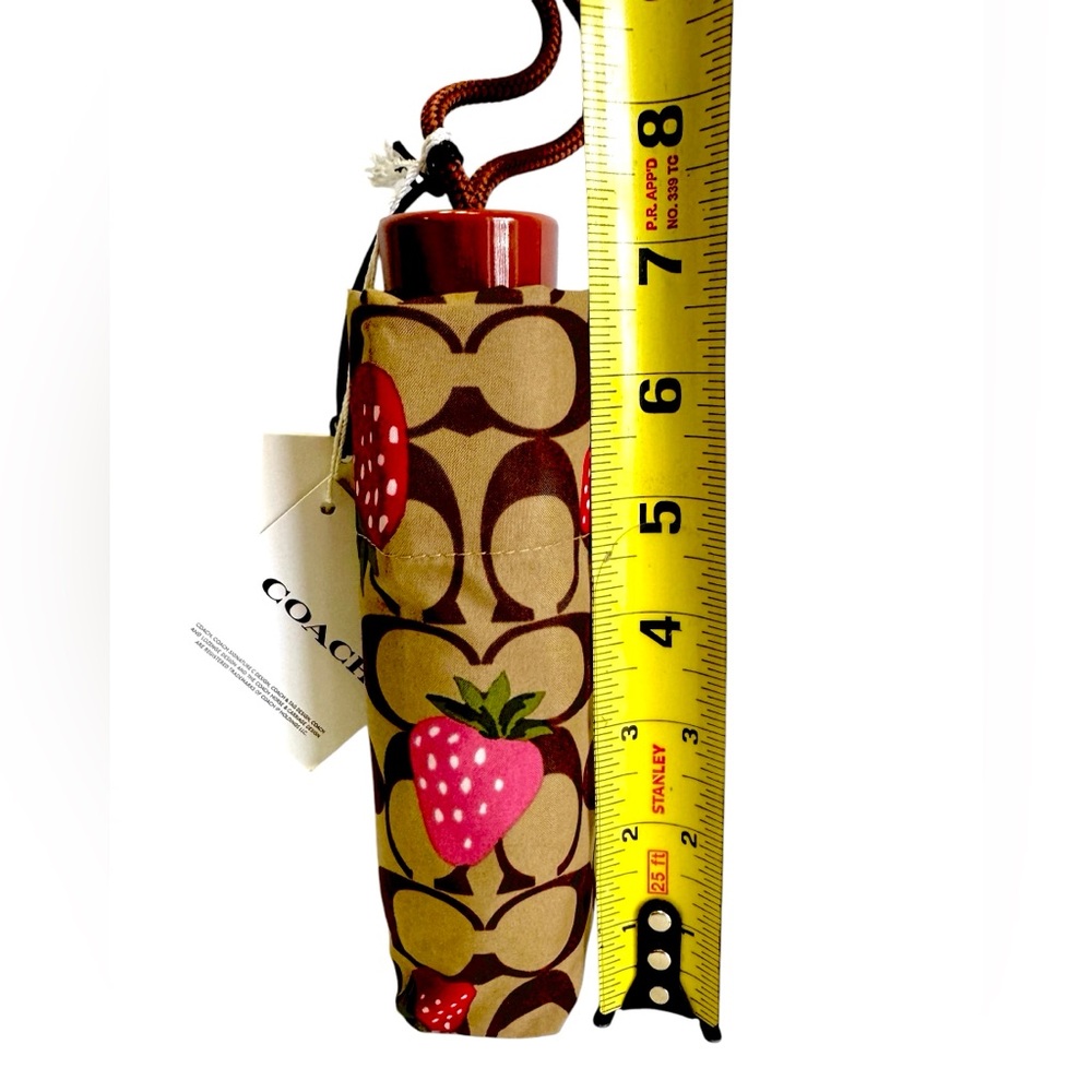 Coach Mini Umbrella In Signature Wild
Strawberry Print. UV Protection CI017. NWT - Picture 2 of 6